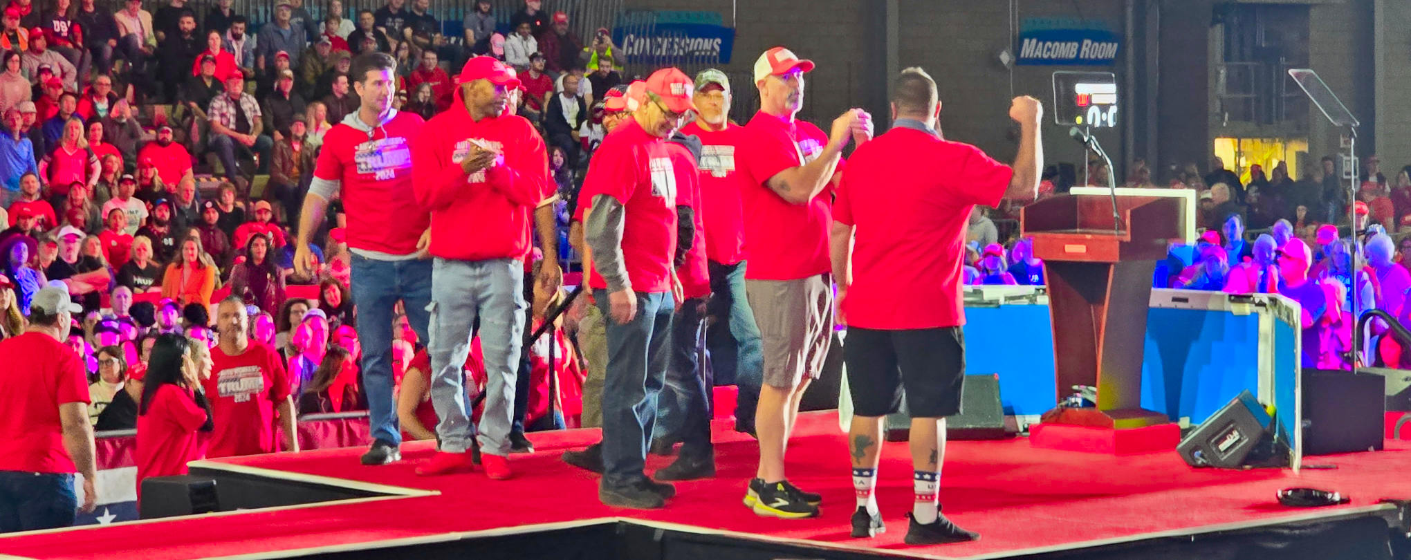 Auto workers for Trump on stage at Macomb County Trump Rally.